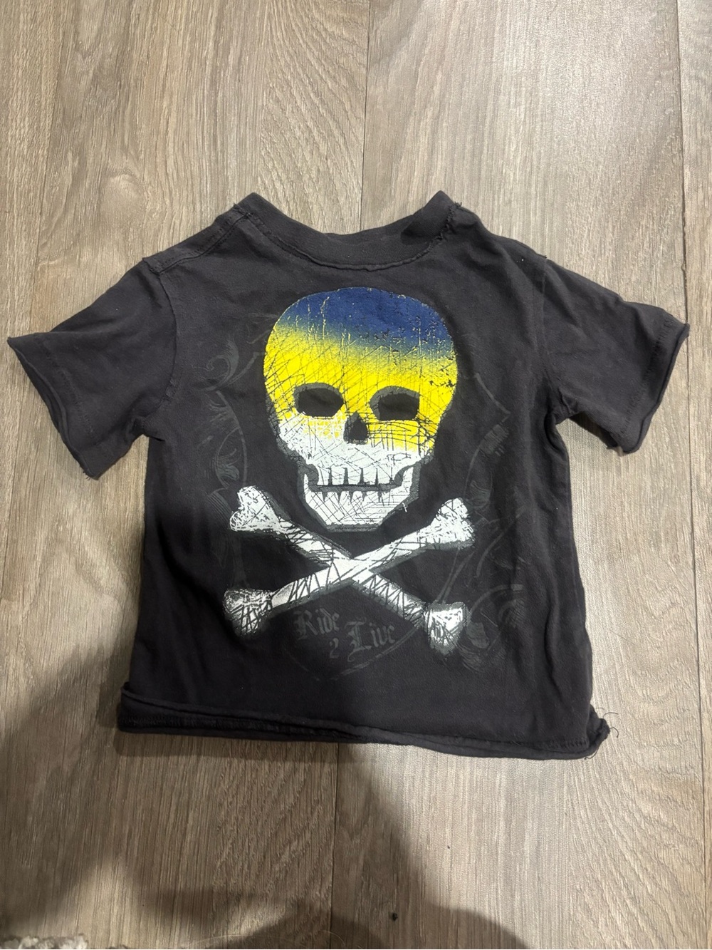 Amy Coe Black Tee with Blue and Yellow Skull Graphic
